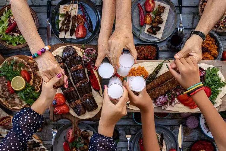 people enjoying a large meal